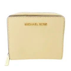 マイケルコース MICHAEL KORS 二つ折り財布 ウォレット 小銭入れあり ラウンドファスナー レザー 革 ロゴ ペールオレンジ /CK31 ■GY19