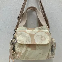 6409　Kipling　キプリング　2way　ハンドバッグ　トートバッグ　ショルダーバッグ　肩がけ　斜めがけ　クロスボディ　総柄　きなり　黄みベージュ　ピンクベージュ　花　フラワー　フローラル　モンキーチャーム　モンキー