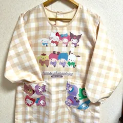 早い者勝ち 売切れごめんなさい★*ﾟサンリオキャラクター 後ボア付き 暖か割烹着 スモックM～L 保育士 保育園 新品
