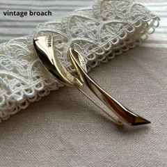 04512ヴィンテージ ゴールドの流線型ブローチ