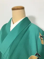 【中古】Sサイズ 化繊 小紋 グリーン地に文字模様