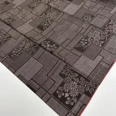 本場大島紬 正絹 裄66 茶泥染め 一元式 幾何学 花絣 袷 着物 MK-1549