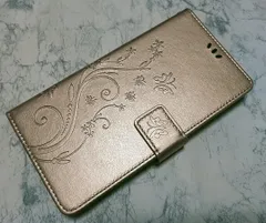 手帳型 iPhone14Plus 用 スマホケース 草花 蝶 エンボス 金色