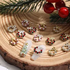 100個セット クリスマスリース ネイルアクセサリー 蝶リボンモチーフ パール ラインストーン 雪の結晶 デコパーツ 付け爪 ネイルデコレーション ネイルアート