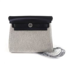 美品△HERMES エルメス 2018年製 ウール100％ 裏地ロゴ総柄 中綿入り