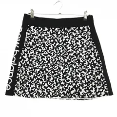 【美品】ニューバランスゴルフ ニットスカート 黒×白 総柄 凹凸地 サイドロゴ レディース 2(L) ゴルフウェア New Balance