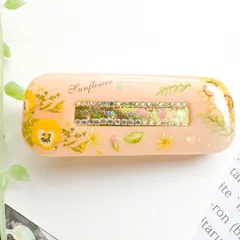 黄色いお花とクリスタルのレジンヘアクリップ