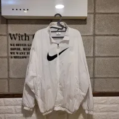 ナイキ ウィメンズ ESSENTIALS エッセンシャルズ ウィンドブレーカー L(90)