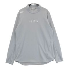 サイズ：L OAKLEY オークリー 2024年モデル ハイネック 長袖Tシャツ  グレー系 [240101579753] ゴルフウェア レディース ストスト