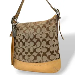 コーチ COACH ショルダーバッグ ブラウン 茶 シグネチャー ホーボー ソフトスリムダッフル 斜め掛け可 ワンショルダー キャンバス レザー 本革 タッセル シルバー金具 ロゴタグ 9362 U9