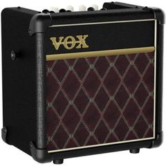 Used, Very Good Condition VOX MINI5 Rhythm CL Guitar Modeling Amplifier with Built-in Rhythm Patterns. Ideal for Classical Practice, Home Practice, and Street Play. Portable, Battery-Powered, Microphone Input, MP3 Connection, and Headphone Compatible. 5W.