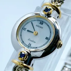 599 セイコー　1E20-0690 エクセリーヌ　シェル　ラウンド　腕時計