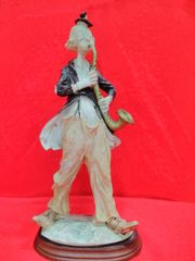 木彫り人形「チューバを吹く男 」A wood carving doll - メルカリ