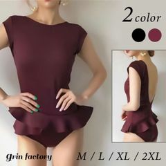 This trendy, ruffled, one-piece swimsuit features a cute, flattering flare and a minimalist design. Available in sizes M, XL, and 2XL, this stylish backless swimsuit is perfect for beaches, pools, and international destinations. Available in black and wine red.