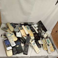 Junk remote controls for air conditioners, TVs, Panasonic, Sharp, lighting, Toshiba, Sony, audio, video, fans, and lighting. Lots and lots of them. P903
