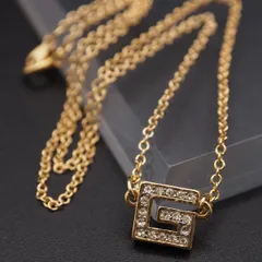 J909 ジバンシイ GIVENCHY PARIS NEW YORK ペンダント ネックレス ロゴ ラインストーン ゴールド デザイン