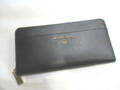 Excellent condition Michael Kors Jet Set Charm Pocket ZA Contour women's leather zip-around wallet in black (product number 4H1GT9E8L 001).