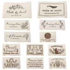 新品 ハンドメイド用 タグ 12種セット 綿 ロゴ ワッペン ラベル お花 猫 フラワー ネコ コットン かわいい おしゃれ DIY 縫製 手作り 手芸 ポーチ/衣類/帽子などに飾り Handmade 英文 (A)