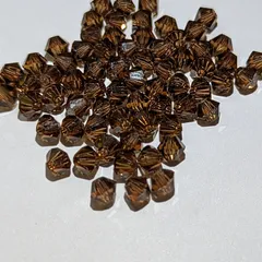 スワロフスキー　4mm ソロバン型　#5301　スモークトパーズ　89粒