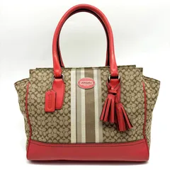 コーチ　シグネチャーバッグ　オレンジ　タッセル　ストライプ
