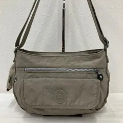 7440　KIPLING キプリング　ショルダーバッグ　ベージュ系　ダークベージュ系　レディース　軽量　カジュアル　シンプル　チャーム付き　モンキー　ゴリラ　ポケット多数　フロントポケット