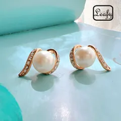 ピアス うず巻き 風 トパーズ色 フェイクパール ゴールド 華やか 創造性 フォーマル 冠婚葬祭 レディース プレゼント ギフト バレンタイン ホワイトデー 卒業式 入学式 新生活 上品 大人可愛い 清楚 モダン  送料無料 即購入OK 最短当日〜翌日発送