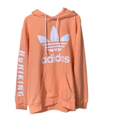 美品 adidas Originals アディダスオリジナルス ファレルウィリアムス ロゴプルオーバーパーカー M オレンジ レディース 古着 中古 USED