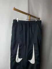 M) ナイキ ウィメンズ AMD ミッドライズ ウーブンパンツ