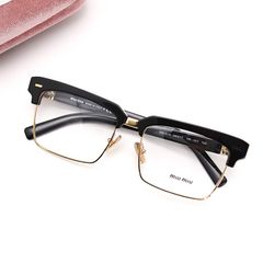 MIU MIU サングラス 黒縁めがね ロゴ金具 クリアレンズ VMU06X-F
