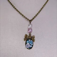 ネックレス リボン 花モチーフ アンティーク風