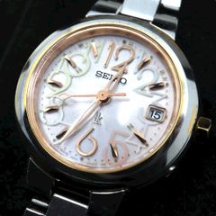 SEIKO Lukia 핑크 문자판 아라비아 인덱스 전파 태양 26mm 라운드 페이스 스테인레스 스틸 여성 시계 G11