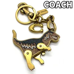【遊び心を大人に添えて】　COACH コーチ　レキシー キーホルダー バッグチャーム シグネチャーコーテッドキャンバス 恐竜 可動式 Cロゴチャーム ゴールド金具　ブラウン