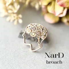 歯車を宿した横顔ブローチ　シンプル アート ゴールド アンティーク調 ヴィンテージ彫金 メンズ 男女兼用 ユニセックス カジュアル かわいい モチーフ キラキラ 新品 大人 コサージュ ギフト プレゼント 新品未使用 NerD