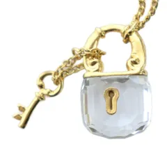 スワロフスキー SWAROVSKI クリスタルメモリーズ ネックレス アクセサリー ペンダント ロゴ カデナ 南京錠 クリア ゴールド色 ■GY11 /MQ