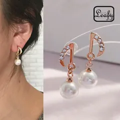 ピアス 音符 フェイクパール ラインストーン キラキラ ピンクゴールド 可愛い レディース プレゼント ギフト バレンタイン ホワイトデー 卒業式 入学式 入園式 冠婚葬祭 冬コーデ 大人コーデ 上品 大人可愛い 耳元 華やか 音楽