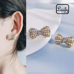 Leafy 結びつけることを表し、約束 絆などの意味が込められているリボンモチーフピアス 主張しすぎないサイズ感でどんなシーンにも活躍してくれるピアス 女性の心をくすぐるデザインで、毎日のコーディネートのアクセントにベビーパール ラインストーン x09455a
