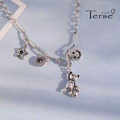 Terse  ぶら下がるテディが何とも愛らしい ネックレス　動くたびにゆらゆら揺れる姿が とっても可愛い シルバートーンブラスペンダント　ベアとスマイルなスタイルが融合  チャンキーチェーンにスター＆CZダイヤチャーム配されたデザイン ぬいぐるみ子熊 くま