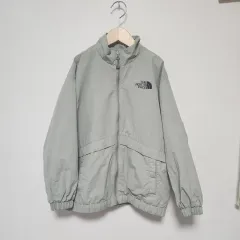 傷なし大ヒット新品同様) THE NORTH FACE ザノースフェイス 薄カーキ ウィンドブレーカー ジャケット 140
