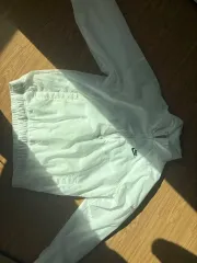 ナイキ 白 ウィンドブレーカー ハーフジップアップ