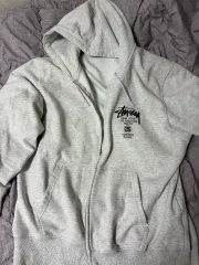 ステューシー ワールドツアー フーディー ジップアップ