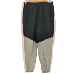 ナイキ NIKE サイドボタン テーパード トラック パンツ メンズ JPN：L 