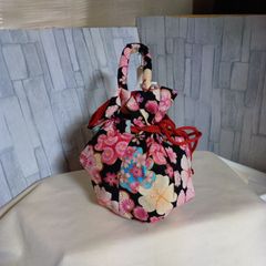 サテンの巾着バッグ ハンドメイド ジョリーフルール - メルカリ