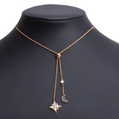 スワロフスキーSWAROVSKI スタームーンモチーフラインストーンネックレス ゴールド