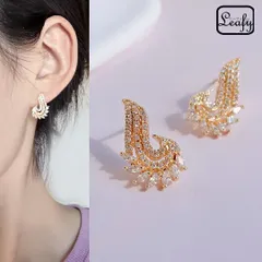 ピアス ゴールドピアス 流れるようなライン 曲線デザイン ジルコニア キラキラ エレガント 女性らしい おしゃれ 卒業式 入学式 プレゼント ギフト 春 新生活 お出かけ パーティー 女子会 デート 普段使い 送料無料 即購入OK 最短当日〜翌日発送