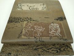 素敵な装い！西陣名古屋帯 綿芯仕立付 「鳥獣人物戯画」クリーム