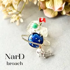 小さな宇宙旅行〜銀河を旅する宇宙飛行士のブローチ　モチーフ かわいい 個性派 ユニーク 宇宙 惑星 星 流れ星 スター ペンダントトップ カジュアル 新品 大人 コサージュ ギフト プレゼント 新品未使用 NerD