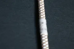 丸帯締め　新品未使用品　薄オレンジ　オフホワイト　AA133