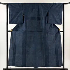 紬 身丈156cm 裄丈64cm M 単衣 綿薩摩 幾何学模様 絣柄 紺色 綿 逸品 【中古】