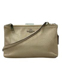 COACH 65周年記念 レガシー キスロック リストレット がま口 - メルカリ