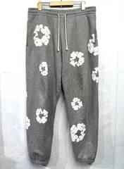 DENIM TEARS｜デニムティアーズ COTTON WREATH SWEAT PANTS スウェットパンツ